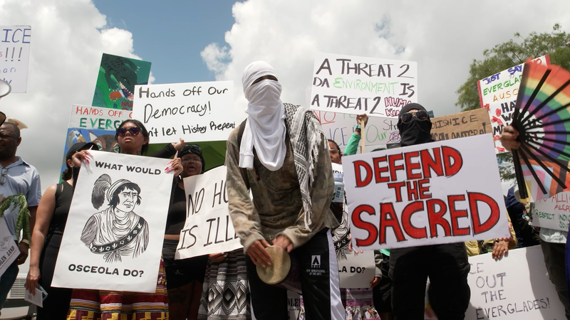 KJ2GWXKSBDDKYOTT12ME - 🌍NewspaperAmigo – Your Global News Buddy 🗞️ Protesters Swamp 'Alligator Alcatraz' as Trump Opens Controversial Detention Center 🐊✊ video poster