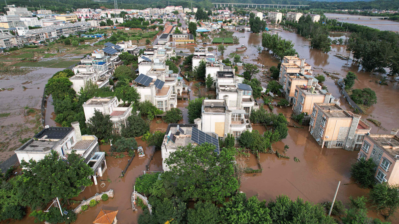 KTZAW2XN6ZIMIQW5SB1D - 🌍NewspaperAmigo – Your Global News Buddy 🗞️ Xi Urges Full Force in Flood Relief Efforts 🌊👨👩👧👦