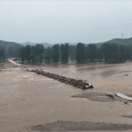 SBZOLMFAQBPME15DYW3O - 🌍NewspaperAmigo – Your Global News Buddy 🗞️ China Battles Severe Flooding as Rescue Efforts Intensify 🌧️🚒