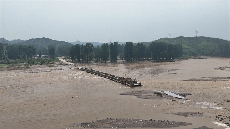 SBZOLMFAQBPME15DYW3O - 🌍NewspaperAmigo – Your Global News Buddy 🗞️ China Battles Severe Flooding as Rescue Efforts Intensify 🌧️🚒