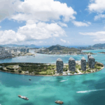 UZRQHM65ZWQ83S5CTZCZ - 🌍NewspaperAmigo – Your Global News Buddy 🗞️ Hainan's Customs Shift Sparks Global Trade Boom 🌏🚢 video poster