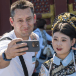 XMZHWLXU8FC9YDJUAUIC - 🌍NewspaperAmigo – Your Global News Buddy 🗞️ Beijing's Tourism Boom: Visa-Free Policy Sparks Global Travel Rush 🌍✈️
