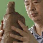 3PIBYNXKPE8996C56TFM - 🌍NewspaperAmigo – Your Global News Buddy 🗞️ Clay Figure Zhang: China’s Timeless Sculpture Art 🎨✨ video poster