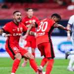 7WXCNF4M5BUX1RBK8RTA - 🌍NewspaperAmigo – Your Global News Buddy 🗞️ Shanghai Port's Title Hopes Hit Snag in Thrilling CSL Draw 🏟️⚽