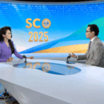 A9BT983L6JUB0SXC3X2E - 🌍NewspaperAmigo – Your Global News Buddy 🗞️ Kazakh Entrepreneur Champions Digital Silk Road at SCO Summit 🌐💼 video poster
