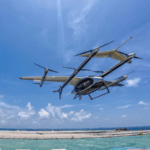 D7HSRQLPEVNJ6OM8B1HF - 🌍NewspaperAmigo – Your Global News Buddy 🗞️ China’s 2-Tonne eVTOL Soars in Historic Offshore Delivery 🚁🌊