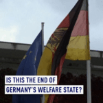 DW0QQ7L8GBU86LFQKLMB - 🌍NewspaperAmigo – Your Global News Buddy 🗞️ Germany’s Welfare State at a Crossroads: Can It Survive? 🌍💸 video poster
