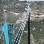KN3MAGP5Z3RE10U2JSJD - 🌍NewspaperAmigo – Your Global News Buddy 🗞️ China’s Huajiang Bridge Set to Shatter World Records 🌉🏆 video poster