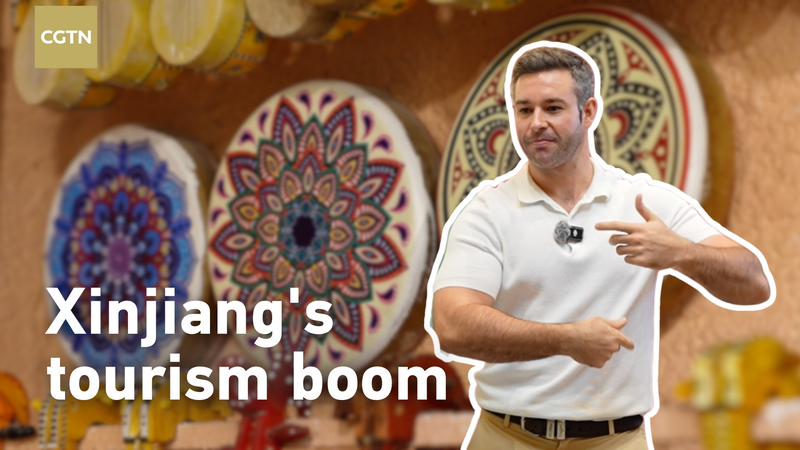 Xinjiang's Tourism Boom Sparks Economic Growth & Jobs 🌄✨ video poster