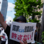 T5WTLLM9JZNND8B5ZQ8N - 🌍NewspaperAmigo – Your Global News Buddy 🗞️ Japan's Yasukuni Visit Sparks Debate Over Militarist Past 🏛️⚖️