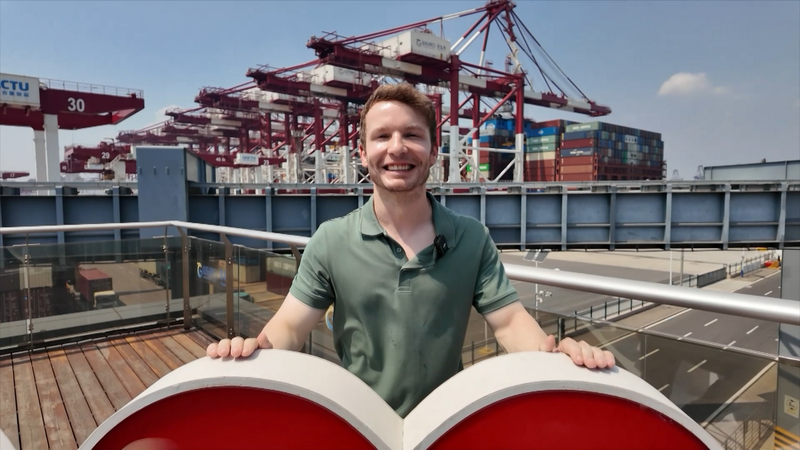 WN4SCZK2NO0O7SJZODV3 - 🌍NewspaperAmigo – Your Global News Buddy 🗞️ Qingdao’s Robotic Port Fuels SCO Trade Boom 🤖🌊🚢 video poster