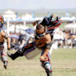 XJPR4XGSJOYLC3W37TBK - 🌍NewspaperAmigo – Your Global News Buddy 🗞️ Mongolian Bökh Takes Center Stage at Naadam Festival 🏅🌾 video poster