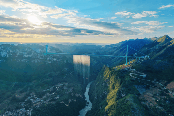 Huajiang Grand Canyon Bridge: World’s Tallest Thrill Opens! 🌉☕ Huajiang Grand Canyon Bridge: World's Tallest Thrill Opens! 🌉☕