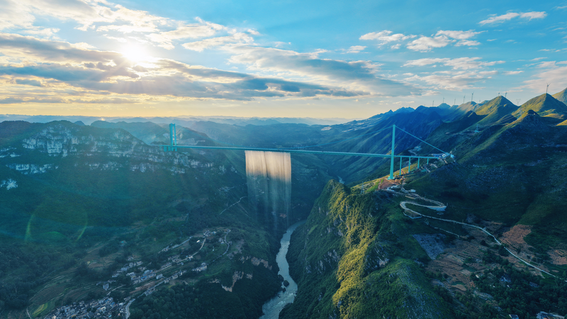 Huajiang Grand Canyon Bridge: World's Tallest Thrill Opens! 🌉☕
