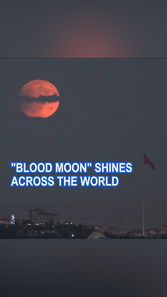 6MRKKTVD16AVJHY4F8LW - 🌍NewspaperAmigo – Your Global News Buddy 🗞️ 🌕 Blood Moon Dazzles Skies Worldwide: A Celestial Spectacle! video poster
