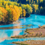 7RXWXMY97LFGHUOCICCK - 🌍NewspaperAmigo – Your Global News Buddy 🗞️ Xinjiang’s Autumn Magic: Golden Landscapes & Lake Mysteries 🍂👾
