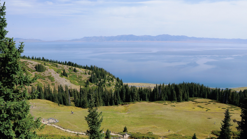 A64QUN4IJJT8E74YJADQ - 🌍NewspaperAmigo – Your Global News Buddy 🗞️ 🌲✨ Discover Xinjiang's Hidden Gem: Songshutou's Breathtaking Views Over Sayram Lake! video poster