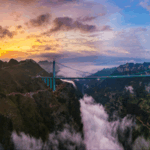 FV9HL3B6PPWTNA8EFTJN - 🌍NewspaperAmigo – Your Global News Buddy 🗞️ China Unveils World's Tallest Bridge in Southwest 🌉🏞️