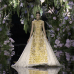 HQIZEQ5QUD01C3P54Z84 - 🌍NewspaperAmigo – Your Global News Buddy 🗞️ Guo Pei's Golden Vision Lights Up Beijing Fashion Week 🌟👗 video poster