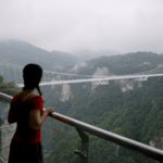 HUX4JZPDXI1H9GCPUNUT - 🌍NewspaperAmigo – Your Global News Buddy 🗞️ Zhangjiajie's Epic Adventures: Stairways, Glass Bridges & Wingsuit Thrills! 🌄✨ video poster