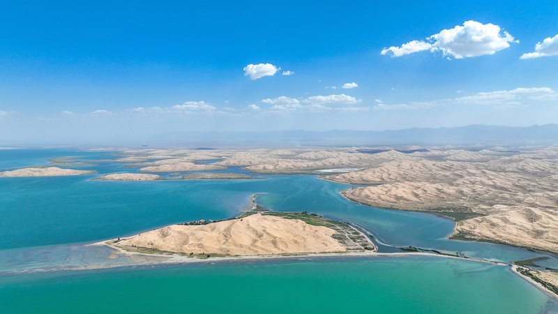 NQFRMXPXQIW4JZB34Y7K - 🌍NewspaperAmigo – Your Global News Buddy 🗞️ Discover Bosten Lake: Xinjiang’s Hidden Gem 🌊✨ video poster