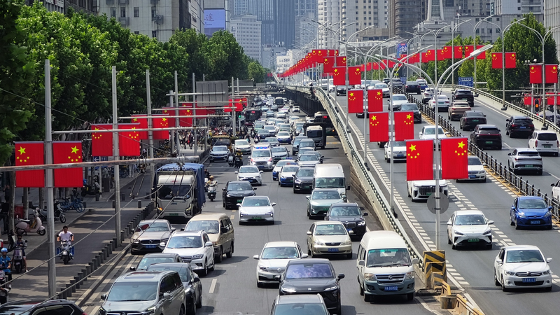 China Braces for 2 Million Daily Border Crossings During Holiday Rush 🚆🌍