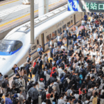 19R5QGZQL40QLV0DSMCK - 🌍NewspaperAmigo – Your Global News Buddy 🗞️ China’s Holiday Boom: Travel & Spending Hit New Highs 🚀