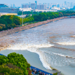 7QDJO7H5O01U7437Q6QA - 🌍NewspaperAmigo – Your Global News Buddy 🗞️ 🌊 Qiantang River Tidal Bore Peaks: Nature’s Spectacle Unleashed! video poster