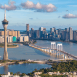 82RKQBWIUJIAAST9E4FA - 🌍NewspaperAmigo – Your Global News Buddy 🗞️ Macao’s 25-Year Leap: How Integration Fuels a New Era 🌸🚀