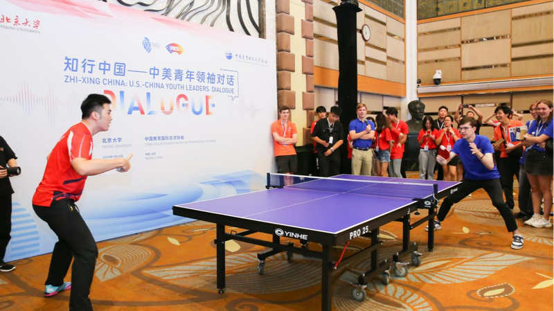 9RTKJR1AIBY5AH76MJUI - 🌍NewspaperAmigo – Your Global News Buddy 🗞️ U.S.-China Youth Dialogue Bridges Cultures Through Ping Pong & Tech 🌏🏓