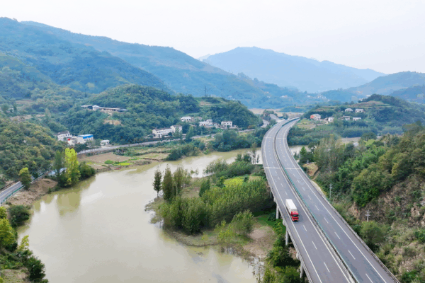 CRHVK1SN12TYE8UEZ5YF - 🌍NewspaperAmigo – Your Global News Buddy 🗞️ Rural Roads Boost Happiness & Economy in China 🛣️💡