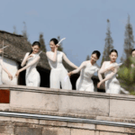 N6S77PBKCM5YZFEBYP1B - 🌍NewspaperAmigo – Your Global News Buddy 🗞️ Xinshi Water Town Revives Tradition with Dance Art Festival 🌊🎨