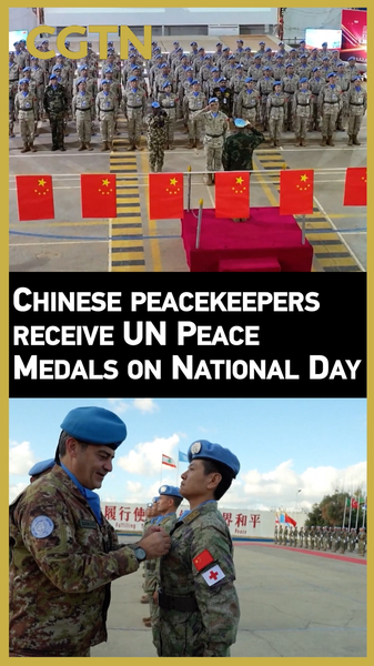 PNJVKJ9MIZ4WSZ7XWZGE - 🌍NewspaperAmigo – Your Global News Buddy 🗞️ 🇨🇳 Chinese Peacekeepers Shine on National Day with UN Medals 🎖️ video poster