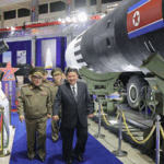 Q5B6MQGGHDZ4LBQ90L4M - 🌍NewspaperAmigo – Your Global News Buddy 🗞️ Kim Jong Un Urges Military Upgrade Amid Rising Tensions 🚨🇰🇵