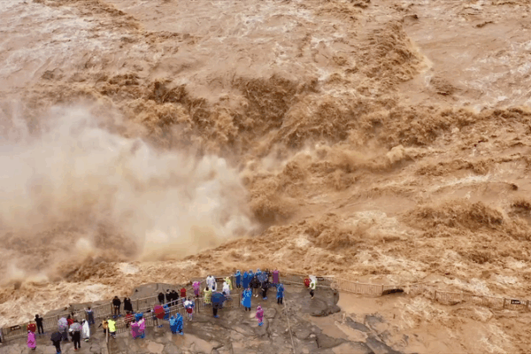 Yellow River Roars: Hukou Waterfall Unleashes Golden Cascade ππ₯ Yellow River Roars: Hukou Waterfall Unleashes Golden Cascade ππ₯ video poster