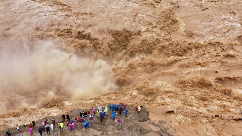 SCHKQ3ET51PFELRADYEI - 🌍NewspaperAmigo – Your Global News Buddy 🗞️ Yellow River Roars: Hukou Waterfall Unleashes Golden Cascade 🌊💥 video poster