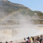 🌈 Nature’s Masterpiece: Hukou Waterfall Dazzles with Rainbow Spectacle! video poster