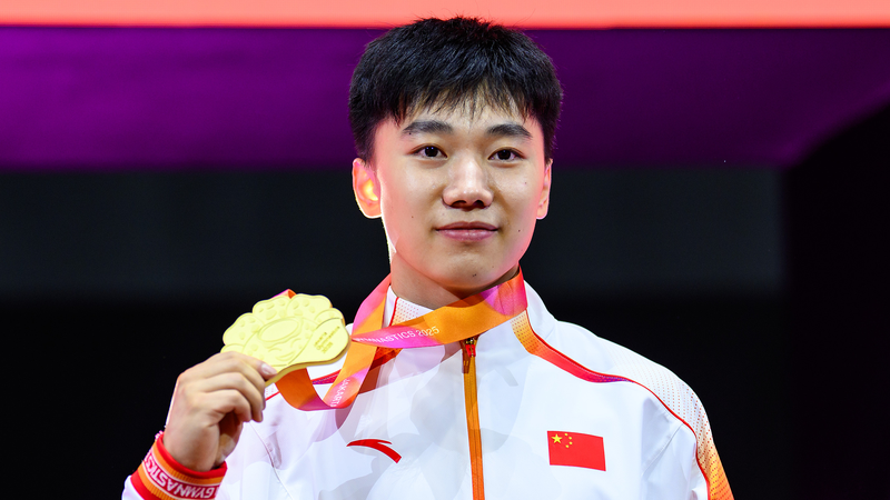 XCAFK3YR6NQQIA75FXZW - 🌍NewspaperAmigo – Your Global News Buddy 🗞️ 🇨🇳✨ Hong Yanming Flips to Gold at Gymnastics Worlds!
