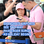 ZB5NVHMLLWJTUDXKET2J - 🌍NewspaperAmigo – Your Global News Buddy 🗞️ Shanghai Airports Packed as Holiday Rush Begins 🛫🌕 video poster