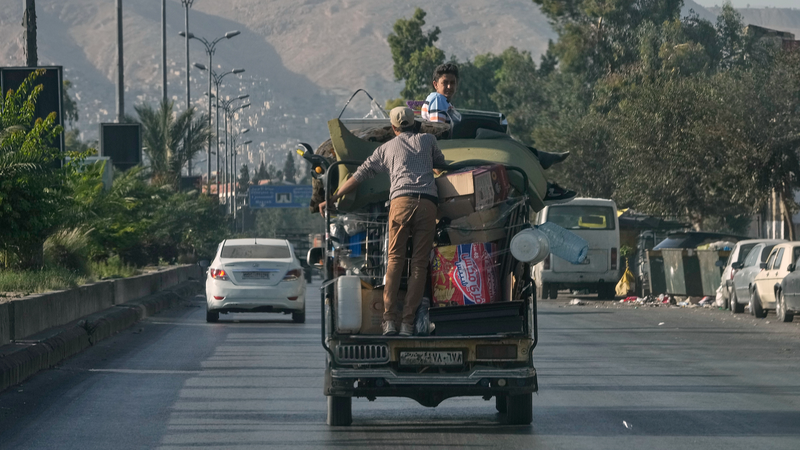 ZLUUUDMBK3XTZVJQI7LW - 🌍NewspaperAmigo – Your Global News Buddy 🗞️ Syria Votes in First Post-Assad Parliament: A New Era? 🌍✌️