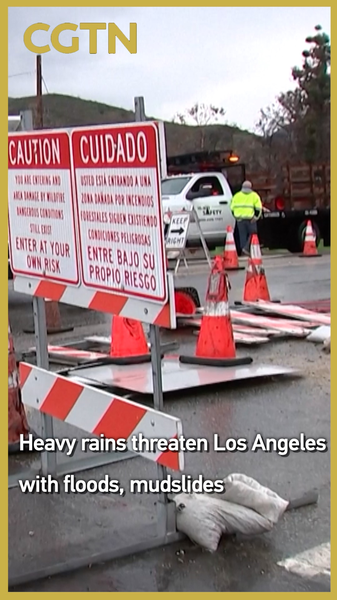 0S5QJWYUHWNTD18E018T - 🌍NewspaperAmigo – Your Global News Buddy 🗞️ LA Braces for Floods as Storms Intensify 🌧️🚨 video poster