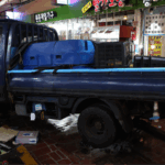 NKTNYV2GBKOLVGNHG09R - 🌍NewspaperAmigo – Your Global News Buddy 🗞️ Truck Crash at S. Korean Market Leaves 2 Dead, 18 Injured 🚚💥
