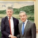 QJAPFN1C5SU7LNKLXPZH - 🌍NewspaperAmigo – Your Global News Buddy 🗞️ Wang Yi Calls for UK-China Collaboration Amid Global Shifts 🌏🤝