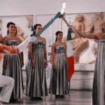 RXT5FAL8QI3T7JRFSV3T - 🌍NewspaperAmigo – Your Global News Buddy 🗞️ 🔥 2026 Winter Olympics Flame Lit in Ancient Olympia! 🏛️