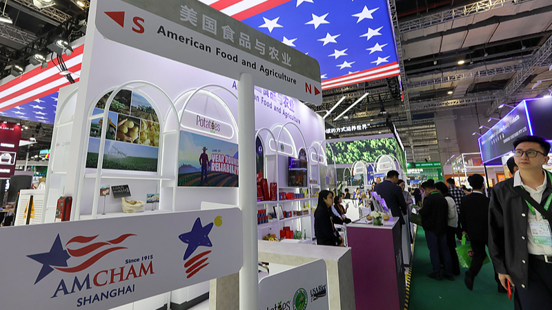 W88Z6AYM9A0C7X9BERGG - 🌍NewspaperAmigo – Your Global News Buddy 🗞️ U.S. Firms Bet Big on China at Shanghai Expo 🌏💼