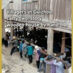 WOWUCFJXXNME23DYFOT1 - 🌍NewspaperAmigo – Your Global News Buddy 🗞️ Guizhou Villagers Move Two-Story House by Hand in Epic Teamwork 🏠💪 video poster