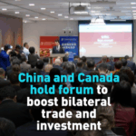 35JB2H7NZC1UYGNB0PG8 - 🌍NewspaperAmigo – Your Global News Buddy 🗞️ China & Canada Forge Trade Ties at Toronto Forum 🌐🤝 video poster