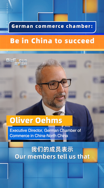 E9NMU1TZEFGBTK3BM0IH - 🌍NewspaperAmigo – Your Global News Buddy 🗞️ German Biz Leader: 'Be in China to Succeed' in 2025 🌏🚀 video poster