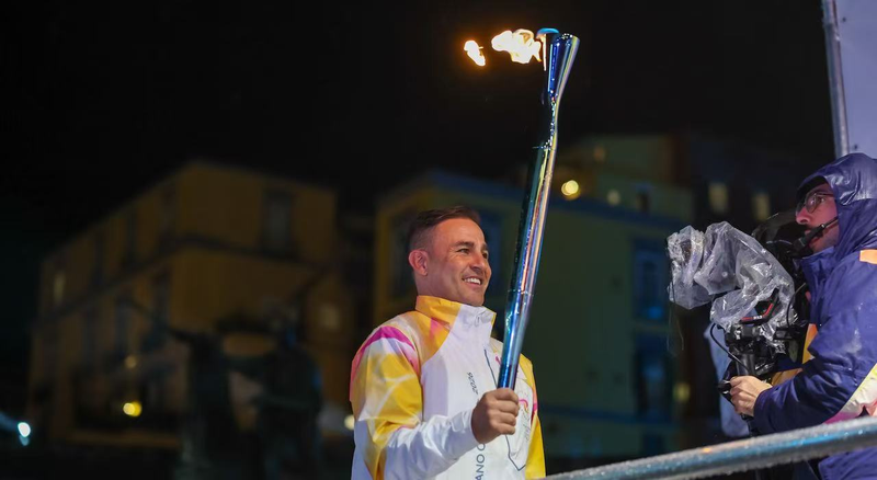 Olympic Torch Lights Up Rainy Naples Ahead of 2026 Winter Games 🏃♂️🔥
