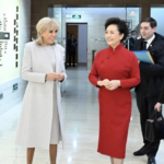 T063QW6XDIN5NWG2RWTL - 🌍NewspaperAmigo – Your Global News Buddy 🗞️ Peng Liyuan and Brigitte Macron Spotlight Cultural Ties in Beijing 🎭 video poster